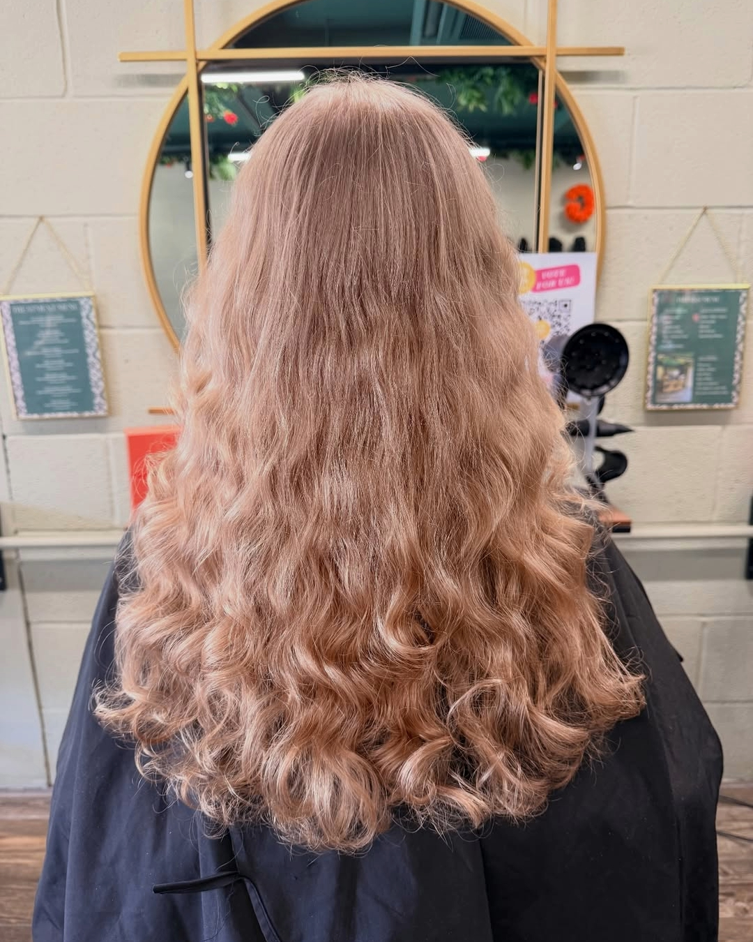 before image of a curly hair makeover on mid length hair